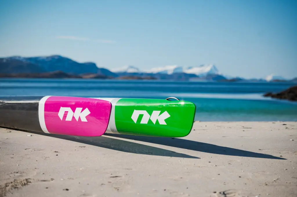 Nordic kayaks on beach